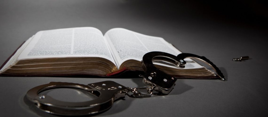 1_Bible handcuffs